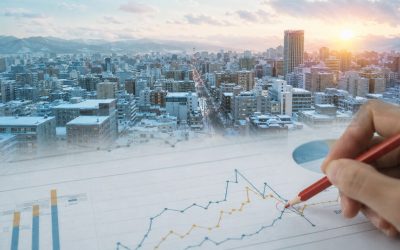 札幌の街並みとアクセス解析データを重ね、改善点を検討するイメージ